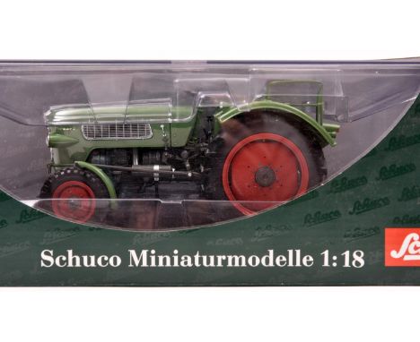 A Schuco 1:18 scale model of a Fendt Farmer II tractor (00110). A very well detailed model in green with red wheels. Boxed, m