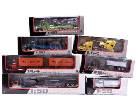 7 First Gear American Trucks. 4x 1:50 scale- 4x Kenworth T880 one with Lowboy trailer, a Dump Truck and 2 Rotator Wreckers. P