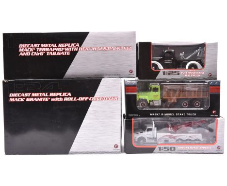 5 First Gear American Trucks. 3x 1:34-  Mack R-Model Stake Truck, 'Steiger Tractor Inc' livery. Mack Terrapro with Heil Half/