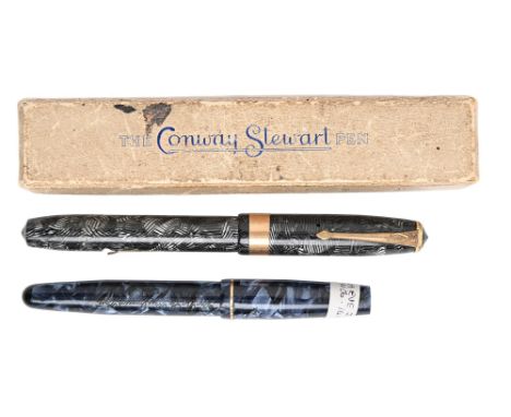 A Conway Stewart fountain pens, maker's gold nib marked 14k, leaflet guarantee and box and a similar De la Rue lady's fountai