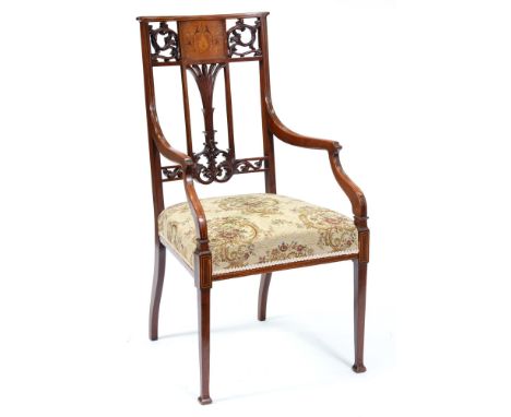 An Edwardian mahogany and inlaid armchair,&nbsp; with carved and pierced splat to the curved back, swept arms, seat height 47