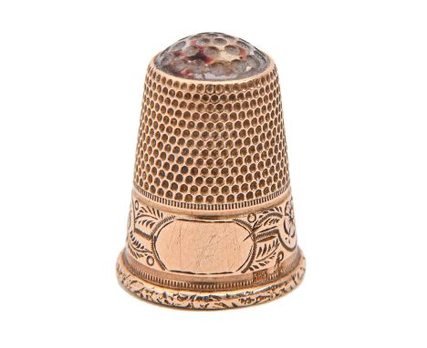 A Victorian gold thimble, with amethyst glass top and foliate engraved border, 22mm h, 4.5g Good condition