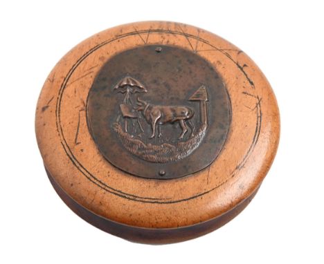 A Victorian turned sycamore snuff box and cover,&nbsp; applied with a copper medallion stamped with a cow at an artist's ease