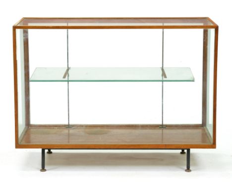 An oak shop cabinet, mid 20th c, with adjustable plate glass shelf, 92cm h; 46 x 122cm Lacks rear sliding plate glass doors, 