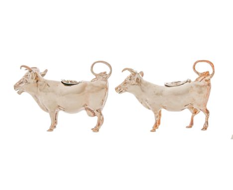 A Victorian silver cow creamer and a similar German silver cow creamer, 10.5cm l, by Maurice Freeman, London 1900 and import 