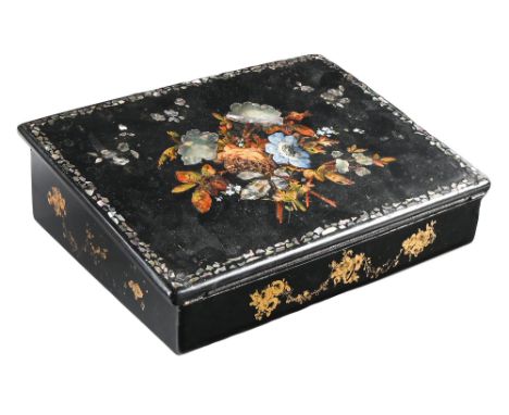 A Victorian papier mache writing box, with sloping lid and fitted interior, decorated in mother of pearl and painted with flo