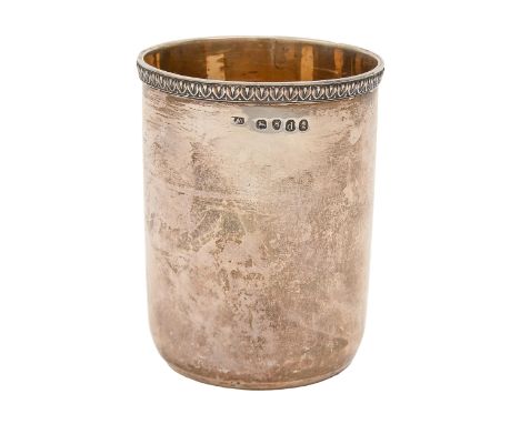 A George III silver beaker, with applied egg-and-dart rim, interior gilt, 89mm h, maker's mark rubbed, London 1819, 5ozs 10dw