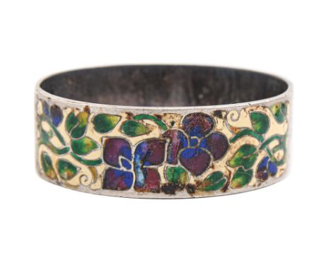 Bernard Instone. A silver and shaded champleve enamel napkin ring, with purple flowers on a primrose ground, oval, 47mm, make