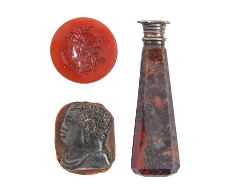 An Italian Grand Tour hardstone cameo,&nbsp;19th c, carved in high relief with the profile of an African, manuscript label to