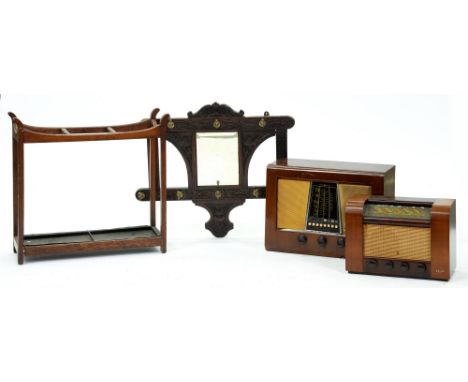 A carved oak&nbsp; hat rack,&nbsp; early 20th c with central mirror, 70cm h x 84cm, an Edwardian oak stick stand and two waln