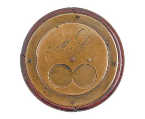 A Victorian round brass faced and backed two finger snuff box,&nbsp; engraved with initials, the back with the figure of a pi