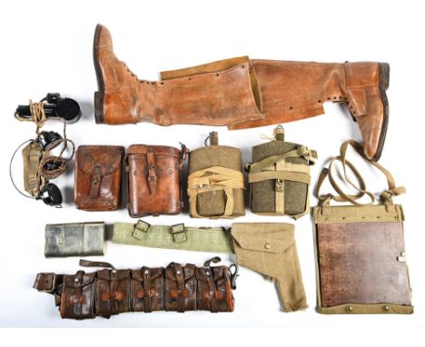 Miscellaneous WWI and WWII British Army accoutrements, to include leather cartridge belt, water bottles, black Bakelite hand 