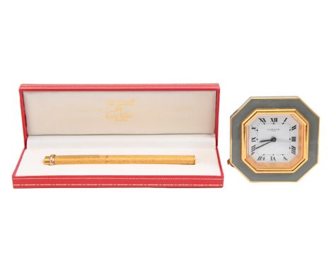 A Cartier giltmetal and French grey enamel strut timepiece alarm clock,&nbsp; 75 x 75mm and a Le Must de Cartier gold plated 