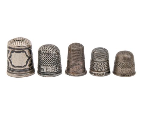 A niello thimble,&nbsp; French or Russian, three miniature silver thimbles and one other, 19th and 19th c, various sizes, 11g