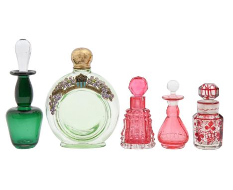 A Victorian cut cranberry glass scent bottle and stopper, 85mm h, a contemporary ruby flashed glass scent bottle and faceted 