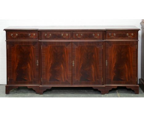 A breakfront mahogany side cabinet,&nbsp; 90cm h ; 45 x 181cm Light scratches