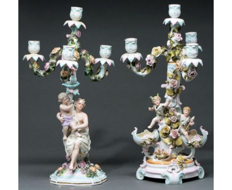 Two Sitzendorf floral encrusted candelabra and matching four light branches, c1900, supported by or applied with a woman and 