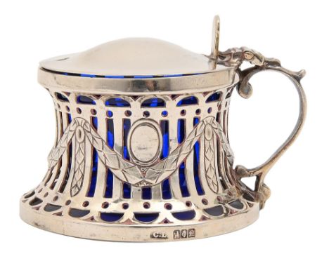 An Irish Edwardian pierced SILVER mustard pot&nbsp;in the form of a dish ring, blue glass liner, 55mm h, by Charles Lambe, Du