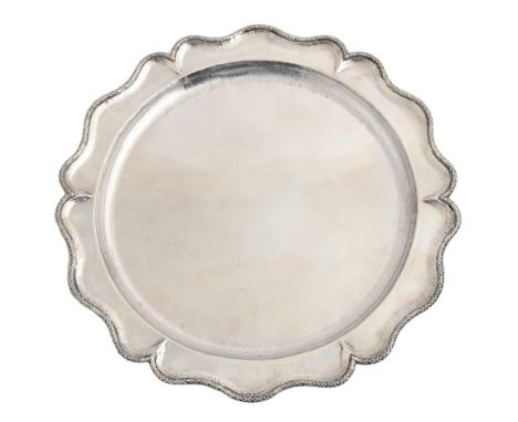 A Continental silver serving or sideboard dish, 20th c, 35cm diam, marked GM 900 in a shield, 17ozs 10dwts Light wear and den