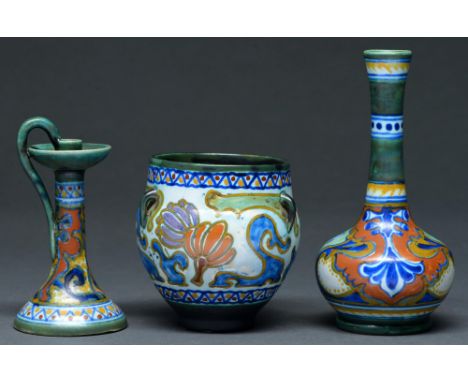 Two Gouda art pottery vases and a candlestick, first half 20th c, larger vase 16cm h, incised numbers, painted marks Three ha
