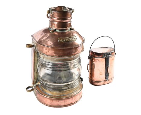 A copper and brass ship's masthead lamp,&nbsp;28cm h excluding handle and a wire handled copper cannister, the lid forming a 