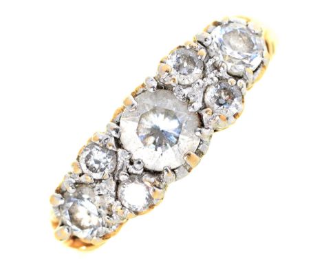 A seven stone diamond ring, in 14ct gold, 2.6g, size L 