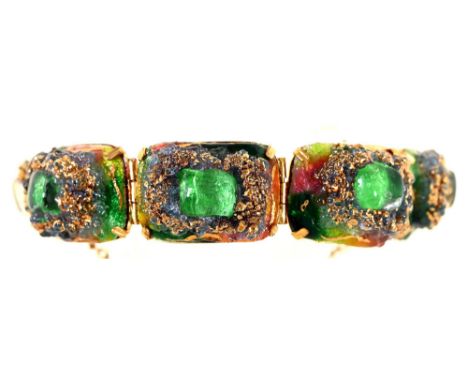 A French green paste cabochon and giltmetal and enamel bracelet,&nbsp; second half 20th c,&nbsp; of six high domed panels, 16