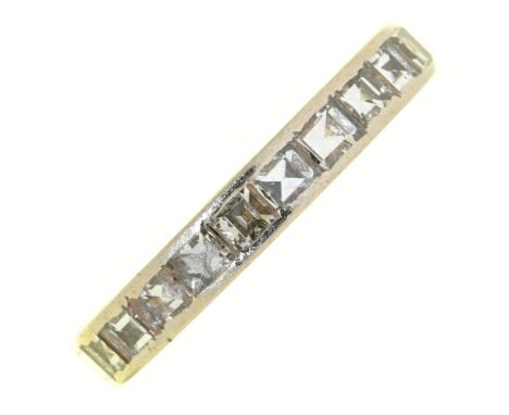 A diamond eternity ring, platinum coloured metal mount, 3.9g, size L½ Much encrusted with dirt, wear to settings, complete, n