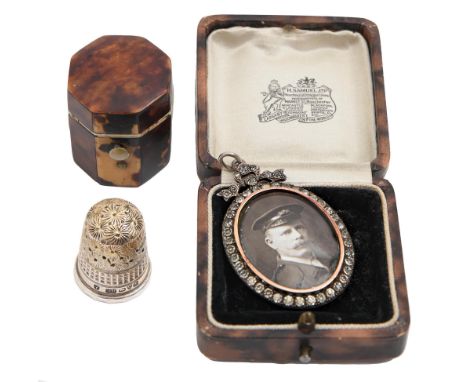 A German paste set oval silver locket, c1900, 51cm, probably Pforzheim, indistinct maker's mark and marked 925, 21g and a Vic