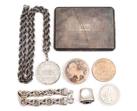 A silver cigarette case, c1929, engine turned, 10.5cm, apparently unmarked, a silver bracelet and rope chain and a South Amer