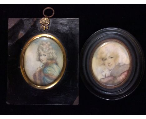 TWO 19TH CENTURY OVAL PORTRAIT MINIATURES ON IVORY A lady wearing blue robes and a mink stole, with label verso 'Miss Farren,