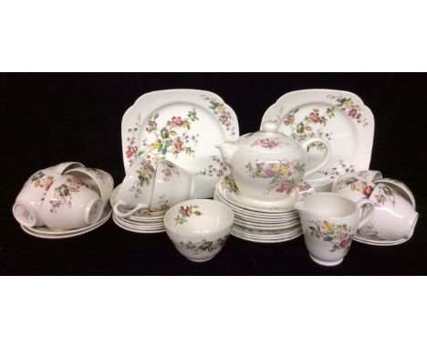 A VINTAGE COPELAND SPODE Tea service,autumn leaves pattern comprising of ten cups,saucers and side plates,sugar and cream,two