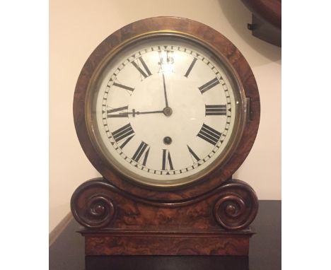 AN EARLY VICTORIAN WALNUT CASED MANTLE CLOCK Mounted on twin scrolls, the later 8" white dial with Roman numeral chapter ring