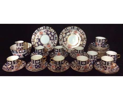 A LATE 19TH/EARLY 20TH CENTURY DERBY STYLE PORCELAIN COFFEE SET Hand painted in the Imari/cigar pattern and comprising of ele