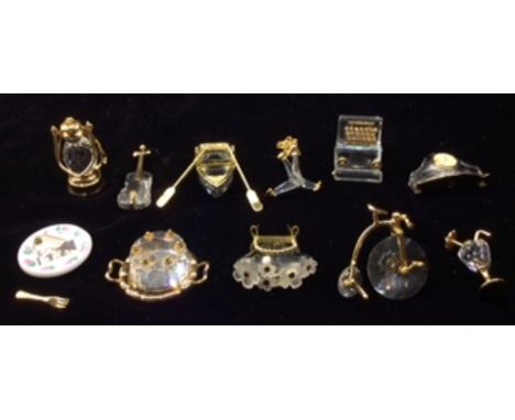 SWAROVSKI CRYSTAL, CRISTAL MEMORIES, A COLLECTION OF ELEVEN GOLD PLATE AND CRYSTAL MINIATURE ORNAMENTS  To include an anchor,