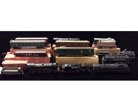 MARKLIN, GERMAN, A 20TH CENTURY TINPLATE ELECTRIC TRAIN SET Comprising a black engine with red wheels marked 'F800 01097' and