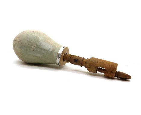 A needlework mannequin head, with boxwood clamp,51cm highCondition ReportMarks and wear to the head. Minor holes to the fabri