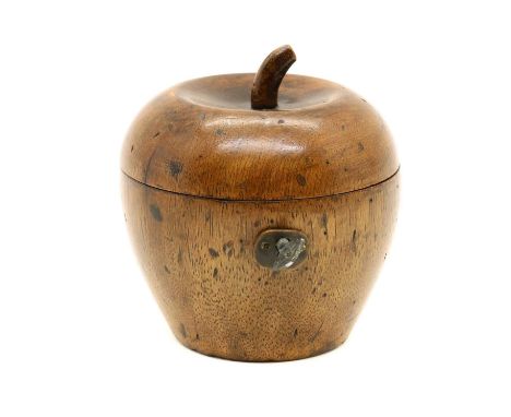 A Georgian style walnut tea caddy,early 20th century, of apple form, with a pierced key and foil lining,11cm highCondition Re