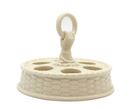 A Belleek first period porcelain egg stand, late 19th/ early 20th century, of basket weave design with hand and ring finial, 