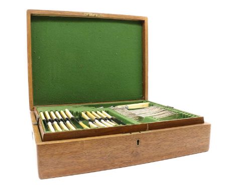 A part canteen of silver flatware,by James Dixon & Sons Ltd, Sheffield 1919, for twelve places, comprising table knives and d