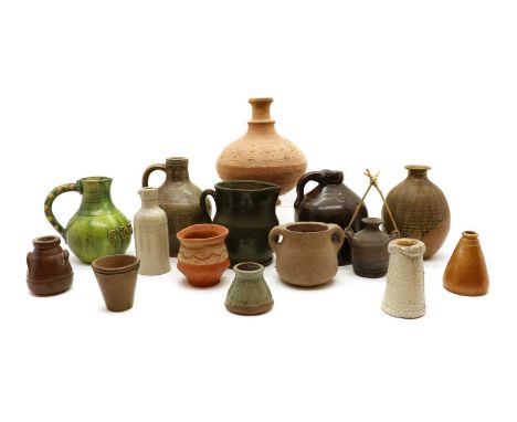 A collection of stoneware and earthenware jugs and vessels,mostly 19th century and later, various sizes and including a Castl