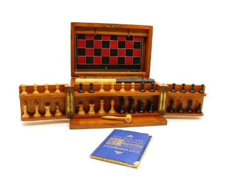 An Edwardian games compendium,retailed by Melliship &amp; Harris, London., the pine box with brass fittings, opening to revea