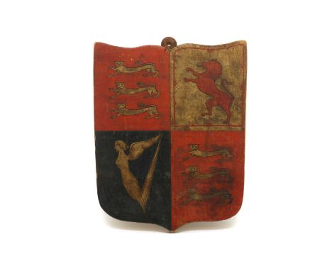 A painted Armorial shield, 20th century, with the Arms of the United Kingdom, on a pine panel 25 x 31cm Condition ReportPaint