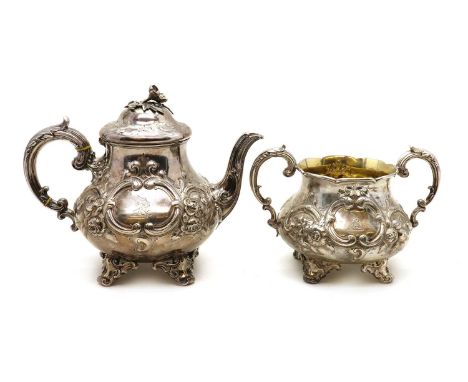 A Victorian silver teapot and sugar bowl, by Edward & John Barnard, London 1854 and 1855, each of squat form with scrollwork,