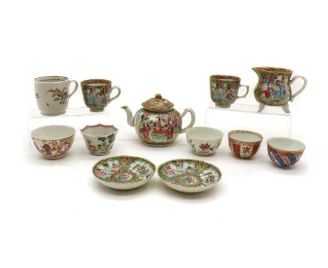 A Canton porcelain tea set for two, late 19th century, each piece decorated with panels of figures and birds, comprising: a t