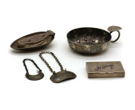 A collection of silver novelties,comprising a French silver taste de vin, 8.5cm wide, a Victorian silver vinaigrette, George 