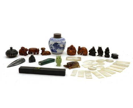A collection of mother of pearl Chinese gaming counters, various sizes, nineteen in total, together with eight hardwood netsu