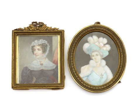 A portrait miniature on ivory,depicting a lady in a lace bonnet in a gilt brass frame,8.5 x 7cm andanother, oval, depicting a