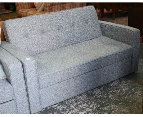 A modern sofa bed by 'Dreams', grey flecked fabric covers,&nbsp;little evidence of use