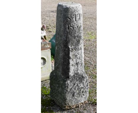 An antique Cornish granite obelisk, probably a boundary marker stone, the weathered surface hatch carved and with lettering t